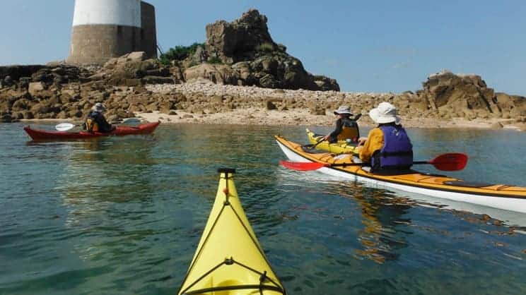 Guide Endorsement. A group explore the coastline of a local landmark.